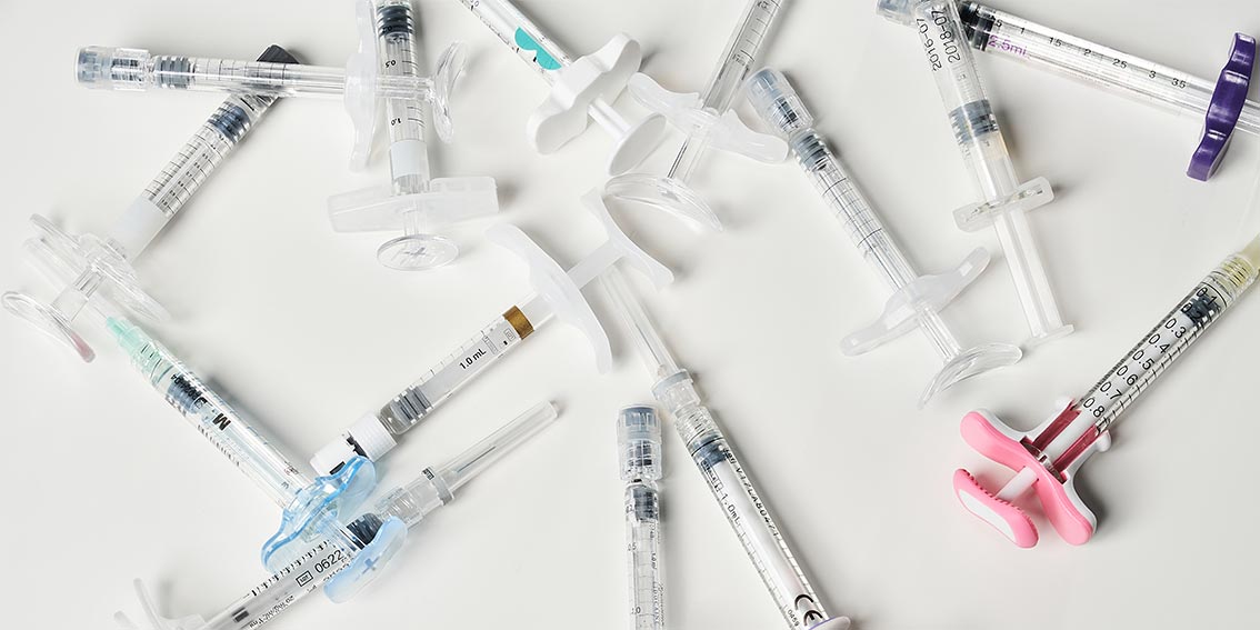 Sterilization of plastic medical syringes